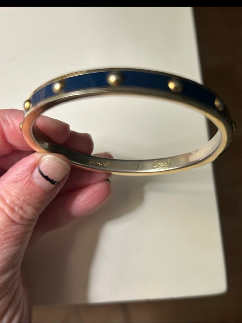 Coach Gold-Tone Bangle with Navy Enamel Studs